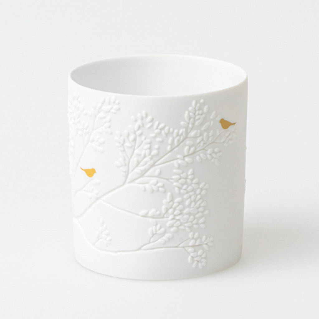 Porcelain light golden bird D.6.5cm H.7cm